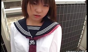 Japanese schoolgirl deep-throats knob well-rounded