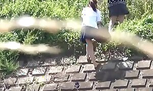 Japanese students pissing outdoors