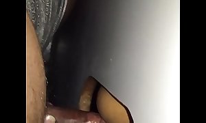 Shafting East person flick through a gloryhole