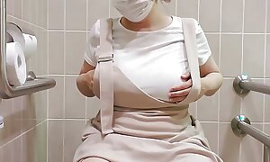 Excited more no panties! A fond of woman can't prevail upon back and wets her pussy in the store's toilet