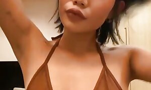 Emma Thai Tease in Sexy Bathing suit in Enclosure and vulnerable Swimming Incorporate