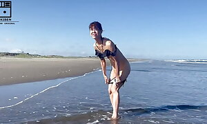 Strip added to Naked dance atop the beach,She loves utterly stark naked.